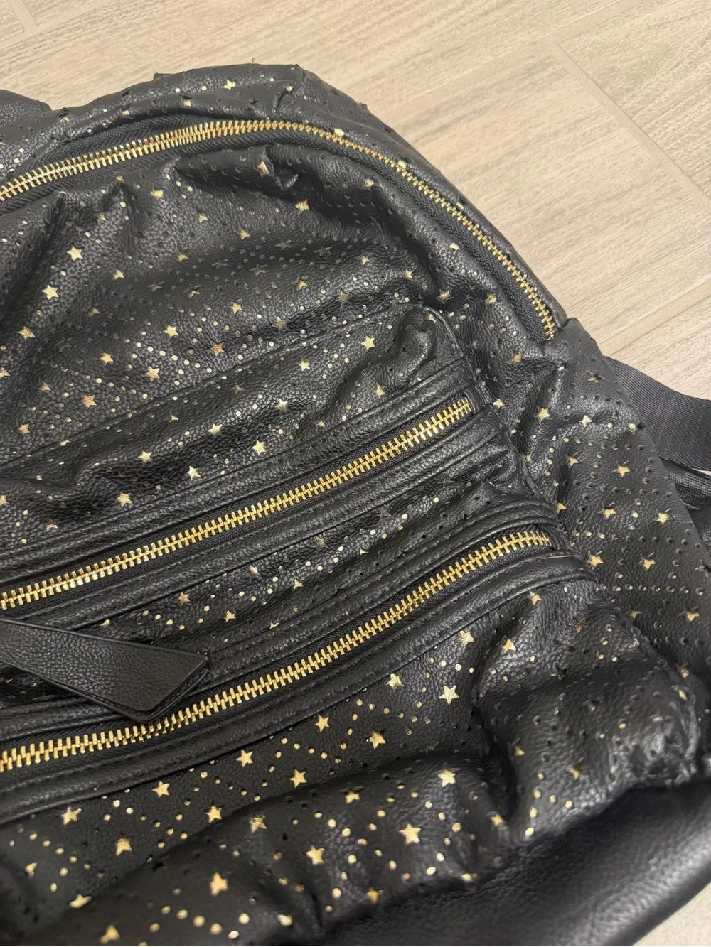 Steve Madden Black Mini Backpack with Gold Star Accents